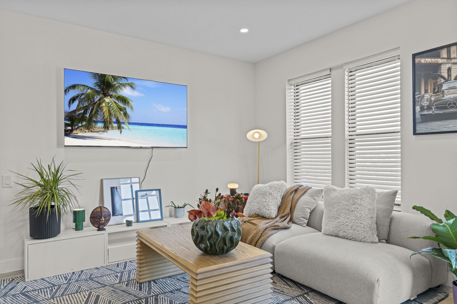 Harper living area with warm light and curated furnishings